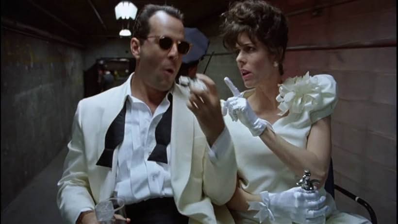 Bruce Willis and Rita Wilson in The Bonfire of the Vanities (1990)