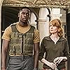 Emily Beecham and Damson Idris in Outside the Wire (2021)