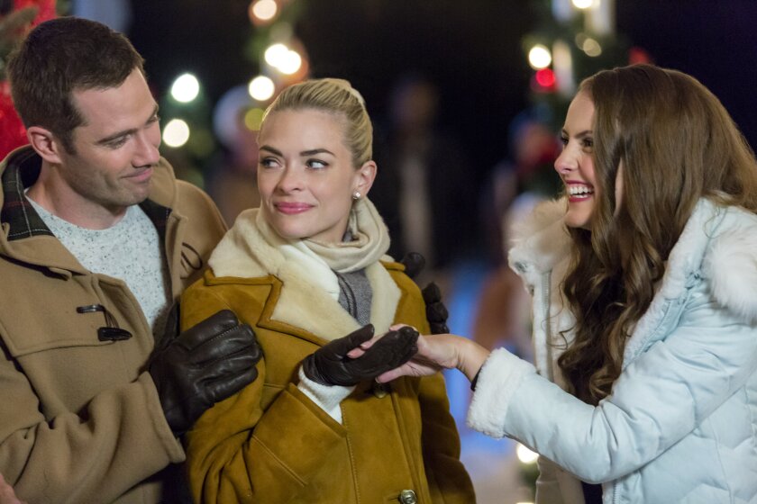 Jaime King and Luke Macfarlane in The Mistletoe Promise (2016)