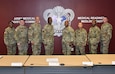 Col. Gary Cooper, center left, and Lt. Col. Nikki Davis, far left, are pictured in an Army Medical Logistics Command command group photo in 2023. Cooper, commander of the U.S. Army Materiel Agency, served as interim AMLC commander for several months, while Davis, USAMMA deputy commander, assumed interim command of USAMMA in Cooper’s stead. USAMMA is one of three direct reporting units to AMLC.