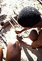 San (Bushmen) preparing poison arrows