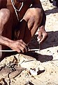 San (Bushmen) preparing poison arrows