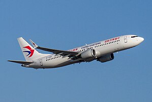 China Eastern, front side, gear up, blue sky