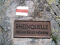 German language sign at Lai da Tuma, Surselva, Graubünden, Switzerland at the source of the Rhine. It says: Rhine source. 1320 km to the outflow