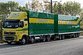 Truck combination of rigid truck and A-frame drawbar trailer.