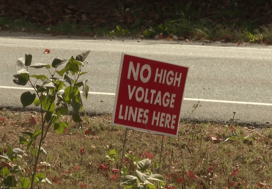 Image for story: Neighbors band together in effort to prevent power line installation on their properties