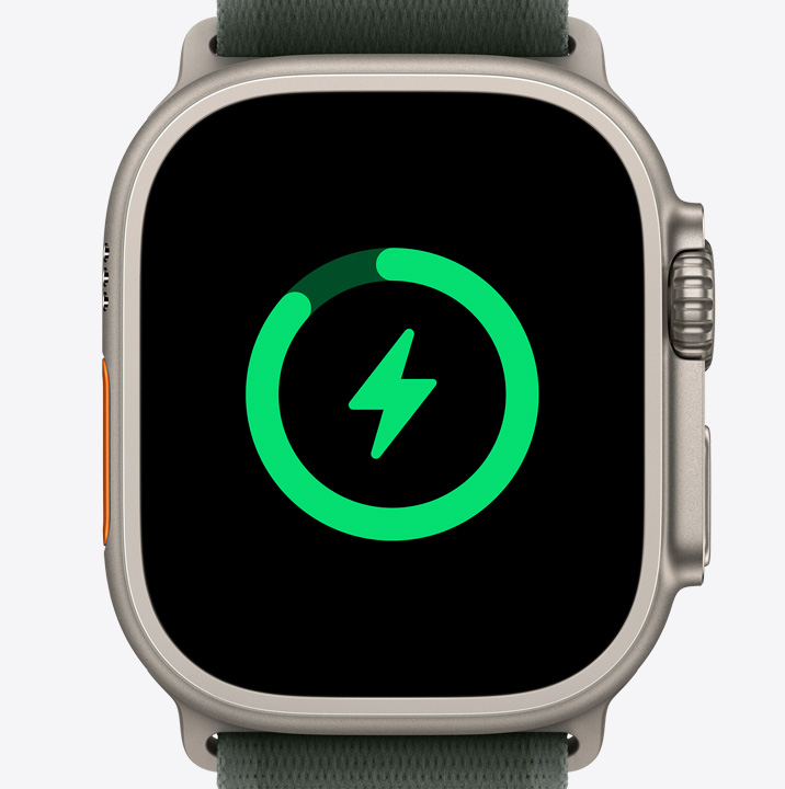 An Apple Watch Ultra 2 showing the battery charging icon.