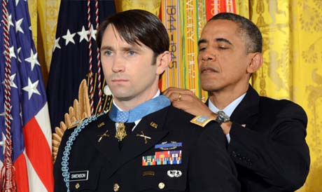 President Barack Obama presents the Medal of Honor to former Army Capt. William D. Swenson, at the White House, Oct. 15, 2013. (Army News Service photo by Lisa Ferdinando)