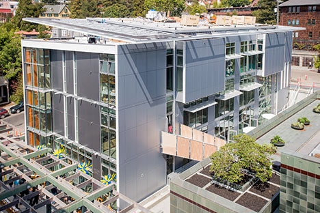 Metal sided building with large glass windows