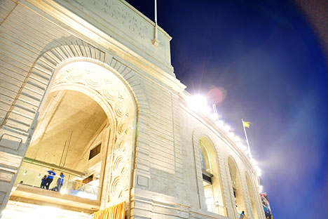 Illuminated arched area of stadium at night