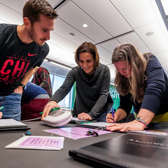 faculty member working with students