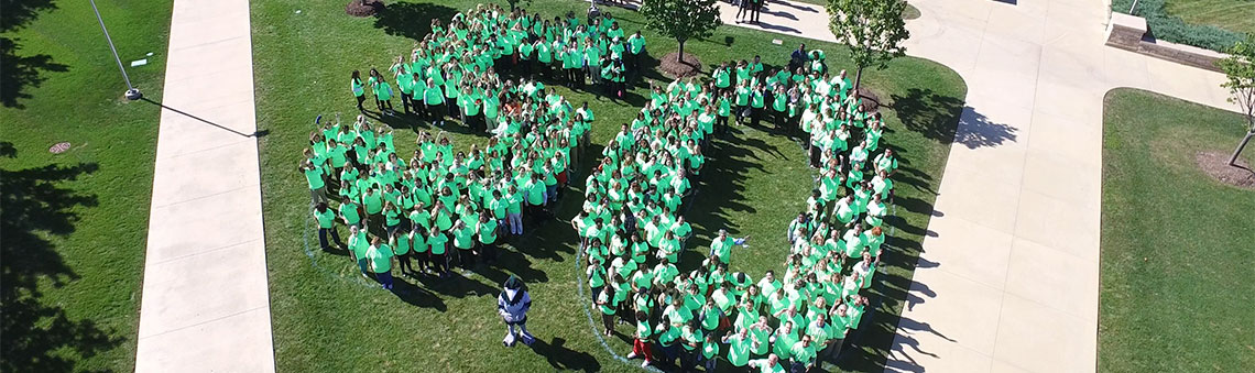 Aerial shot of employees spelling out 50