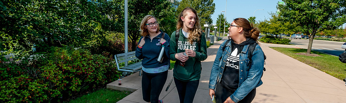 students walking outside and talking