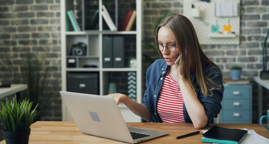 Image of a new business founder working on her laptop.