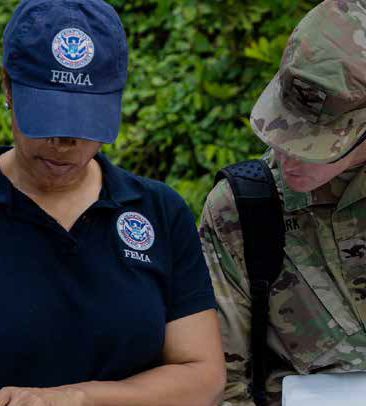 FEMA Employee with Miltiary Personnel