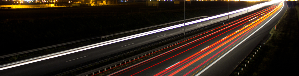 Long exposure traffic on the move with headlights on