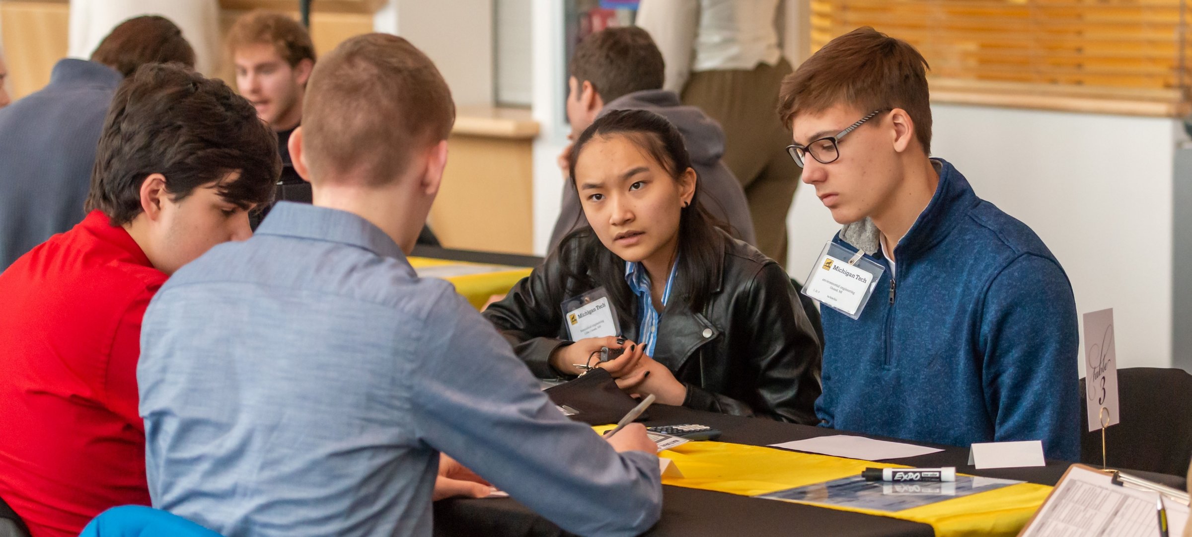 Students participating in the unbox challenge