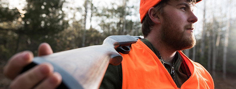 Hunter with firearm